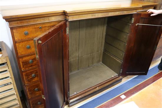 A late Regency banded mahogany breakfront linen press, 	 W.222cm